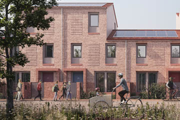 Burnholme Green external photo showing people utilising the outside space around the properties